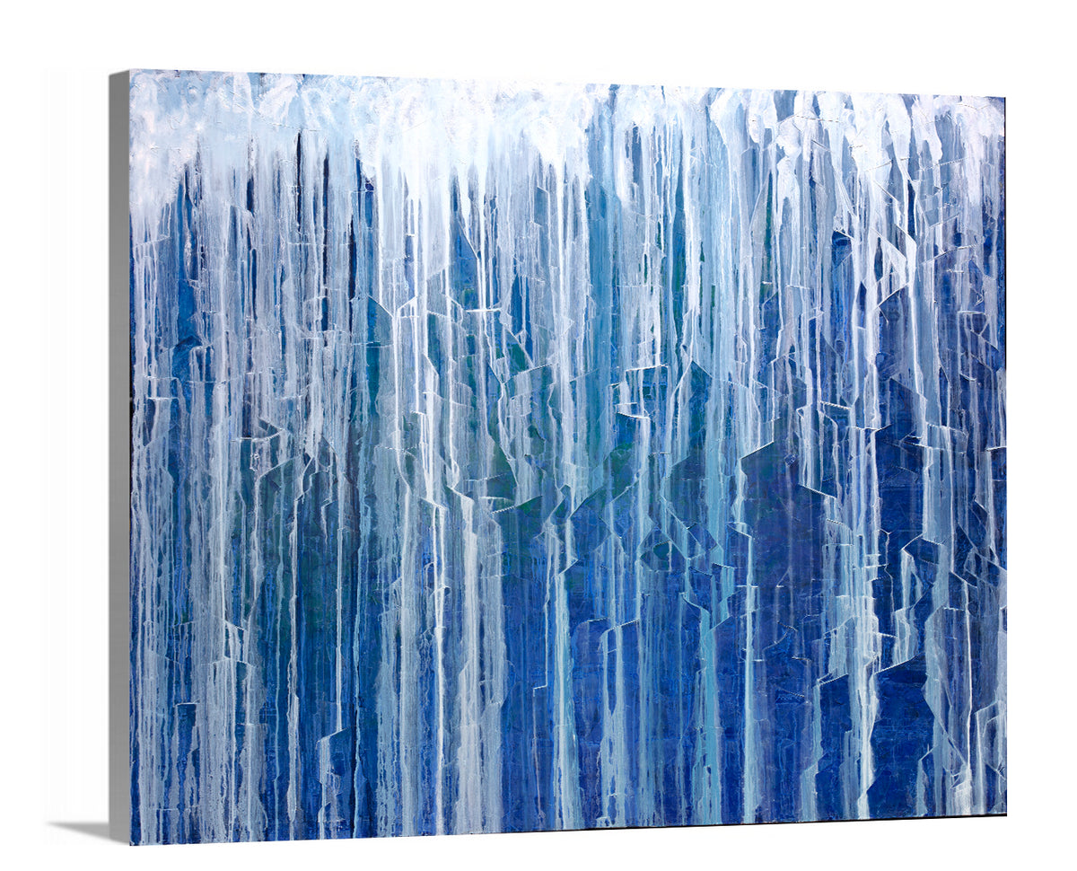 A side-angle view of a blue and white abstract print on canvas.