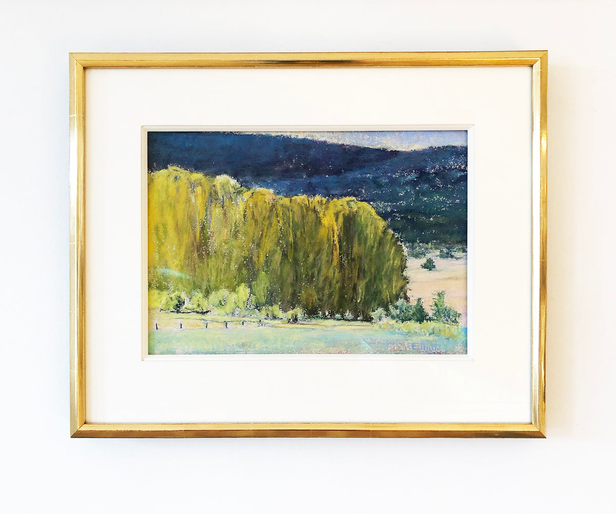 The painting, Study, Highland Greens by Ken Elliott hanging on a white wall matted in a gold frame.  
