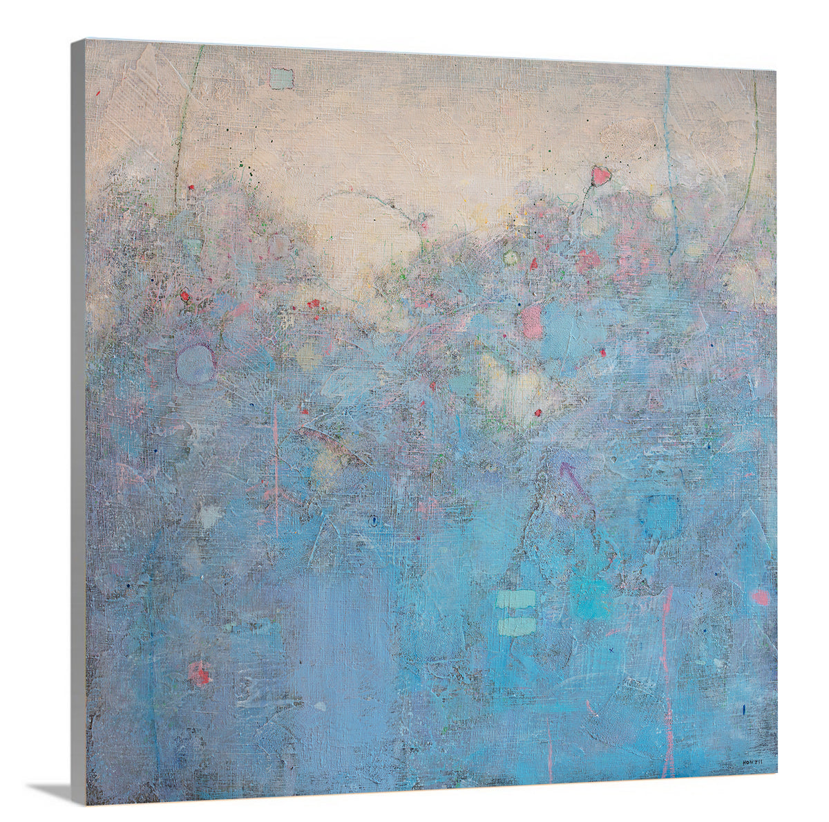 A side-angle view of a blue abstract landscape print by Elwood Howell on canvas.