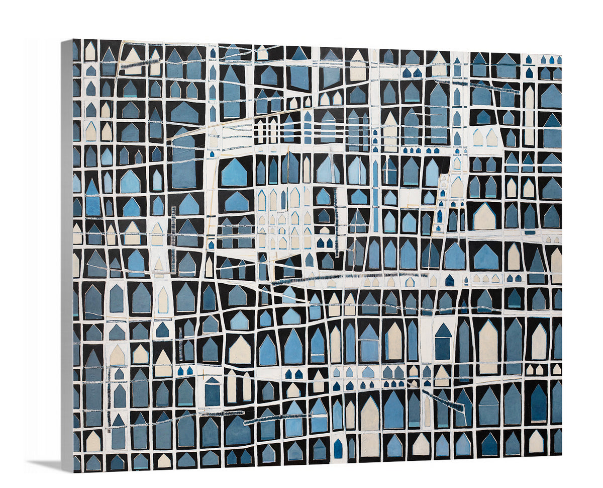 A side-angle view of a blue, black, beige and white abstract house print on canvas.