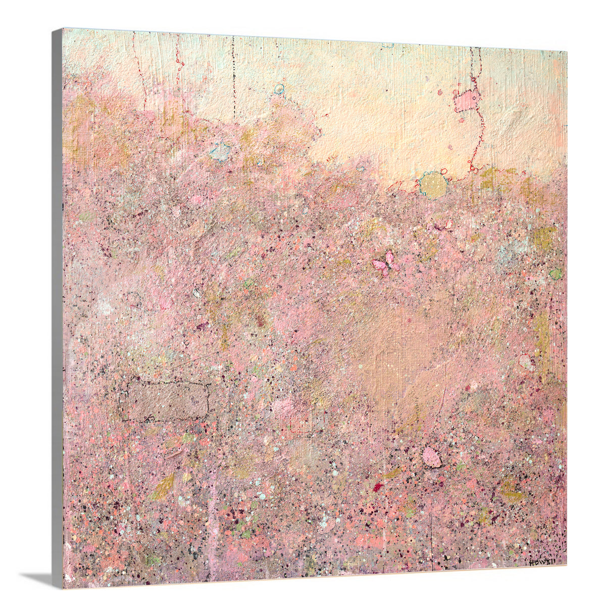A side-angle view of a pink abstract landscape print by Elwood Howell on canvas.