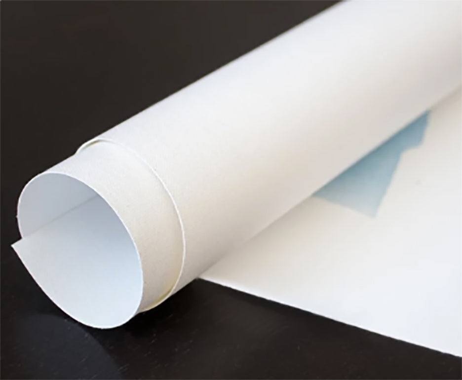 A close up view of a rolled canvas.