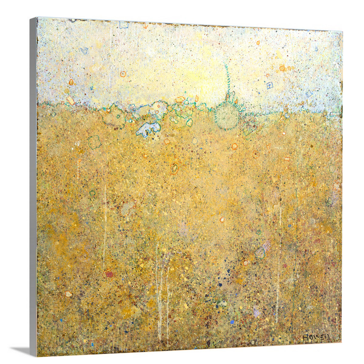 A side-angle view of a yellow abstract landscape print by Elwood Howell on canvas.