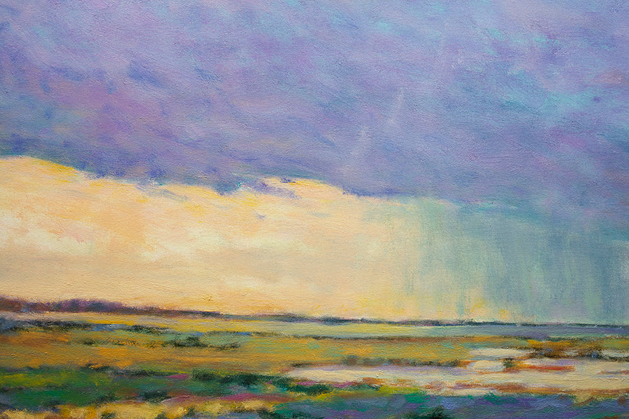 A close up detail of the muted yellow sunlight coming together with the light blue, purple, and pink clouds from Ken Elliott's painting, Summer by the Shore.