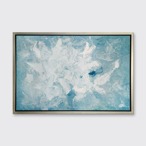 A blue and white abstract print in a silver floater frame hangs on a white wall.